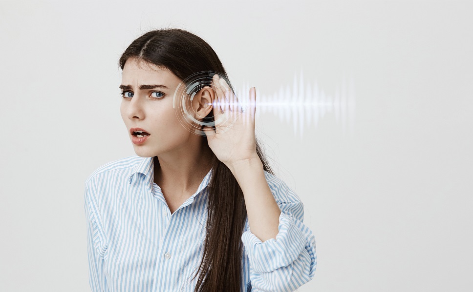 Imprimir Photo of woman holding hand to her ear with sound waves illustrates blog "Why Is My HVAC Whistling?"