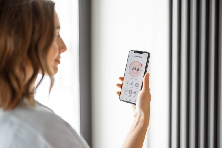 Smart thermostat controlling HVAC in California heat