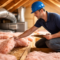 technician checking poor insulation affecting AC efficiency in attic