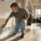 Homeowner noticing Texas summer AC warning signs indoors